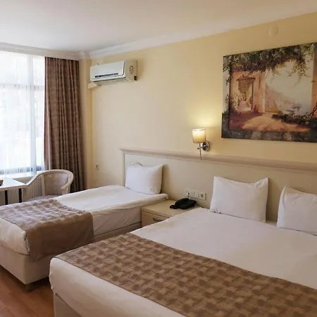 מלון Troia Tusan 4*